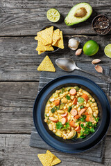 white bean chickpea chili with sausages, zucchini