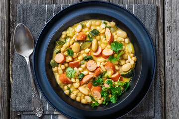 white bean chickpea chili with sausages, zucchini