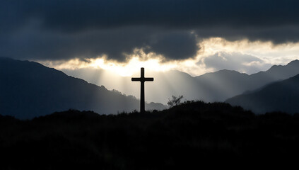 Obraz premium a cross is silhouetted against the sky,