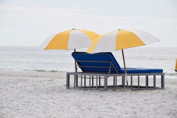 beach chairs and umbrella on the beach