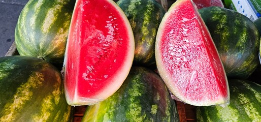 Watermelon slices for sale, summertime treat.