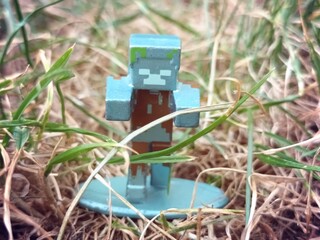 Naklejka premium Mojang metal Minecraft figurine