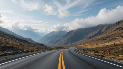 Winding Asphalt Road Through Majestic Mountain Landscape Under Dramatic Cloudy Sky