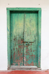 Weathered Green Double Door, Rustic Building Entrance