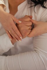 bride and groom holding hands