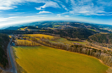 Naklejka premium High resolution stitched winter drone panorama captured in flight at Kostenz, Perasdorf, Straubing-Bogen, Bavarian forest, Bavaria, Germany