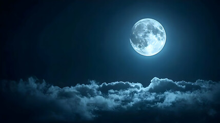 Fototapeta premium Bright Blue Full Moon Illuminating a Cloudy Night Sky with a Serene and Tranquil Atmosphere