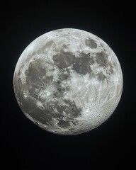 Fototapeta premium Detailed lunar surface with craters and shadows creating a celestial spectacle against the dark space offering cosmic wonder