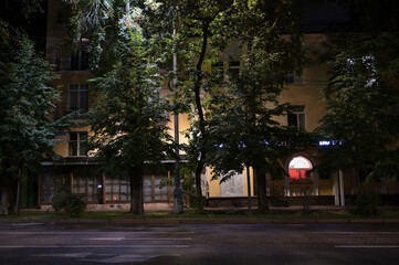 Almaty city evening streets with old buildings. Kabanbay batyr street.