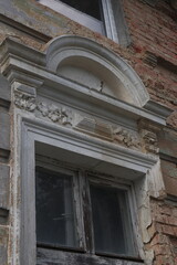 Obraz premium figured stucco on the facade of old buildings