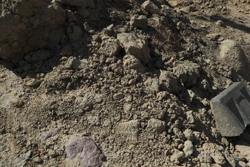 light beige sand illuminated by yellow sunlight