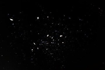 paper ash particles on white background isolated