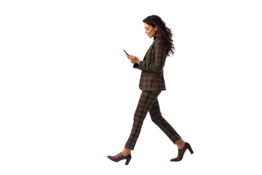 Professional woman walking and typing on a mobile isolated on transparent or white background, png