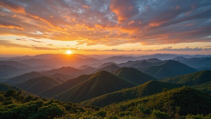 Obraz premium Breathtaking Sunset Over Majestic Mountains and Valleys in a Scenic Landscape