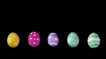 Easter eggs with floral, striped, dotted, and geometric patterns in green, blue, pink, and yellow gracefully rotate while falling and bouncing of the floor against an alpha channel background.