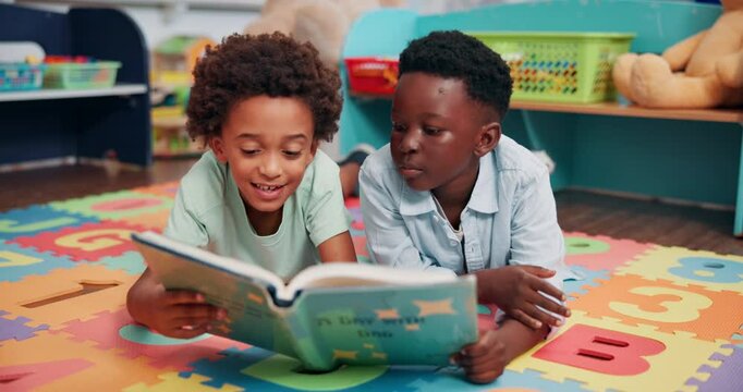 Reading, friends and children with book in classroom for learning, development or growth. Kids, relax and boy students with storytelling on floor mat for literacy knowledge at elementary school.