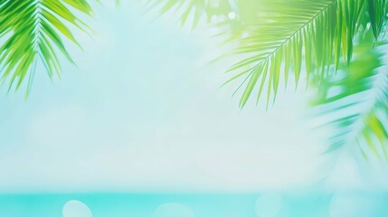 Fototapeta premium abstract background with tropical palm leaves and blurred ocean view in bright green and blue tones soft focus 