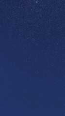 Fototapeta premium A dark blue background filled with a myriad of sparkling stars scattered across the sky, creating a calming and infinite atmosphere. The stars shine brightly against the deep blue backdrop.