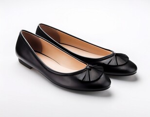 classic black ballet flats with rounded toes isolated on a white background minimalist footwear design