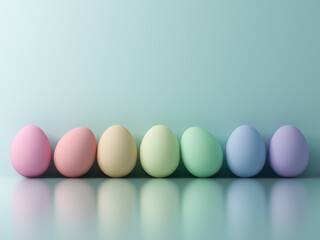 Colorful Easter eggs on light blue green pastel color background with reflections and blank space above 3D rendering