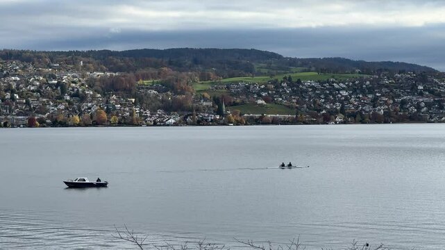 Paddling and water sports at Lake Zurich, Z&uuml;richsee, view from Thalwil