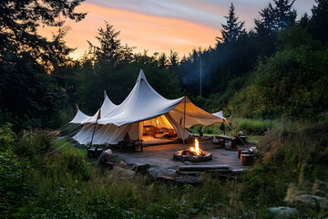 Tranquil Wilderness Camp: Handcrafted Outdoor Tent amidst Lush Forest Scenery with Cozy Campfire