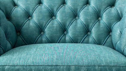 Close up of teal tufted upholstery.