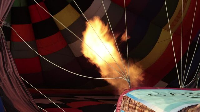 Handheld Inside Colorful Hot Air Balloon with Fire Frame. Funny Balloon Festival Activity