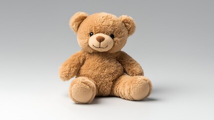 Obraz premium Cute Brown Teddy Bear Toy Sitting on Neutral Background for Childhood Memories and Comfort