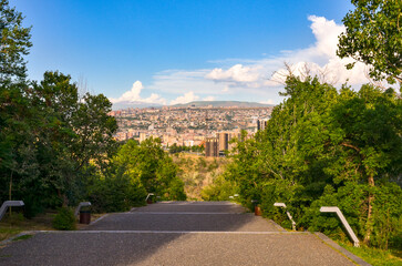 stairway with city scenic views in Tsitsernakaberd park (Yerevan, Armenia)