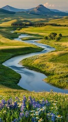 Fototapeta premium Tranquil river winding through vibrant meadows and rolling hills at sunrise