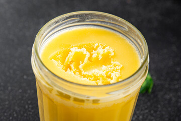 Ghee butter or clarified butter delicious gourmet food background on the table rustic food top view copy space keto and paleo diet vegetarian and vegan food