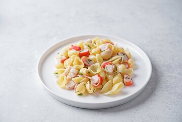 Imitation crab sticks pasta in a plate © nata_vkusidey