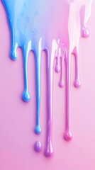Colorful paint drips running downward on a pastel background surface
