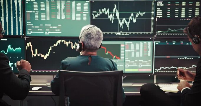 Happy, business people and screen with high five for stock market investment or profit at call center. Back, brokers or excited agents with smile, chart or graphs for winning, teamwork or increase