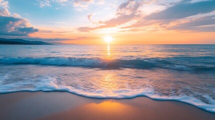Fototapeta premium Golden Hour Beach: Serene Ocean Waves and Beautiful Sunset Scenery Perfect for Wallpaper or Backgrounds.
