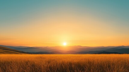 Fototapeta premium Breathtaking sunset over majestic mountains and a serene grass field, golden hour landscape