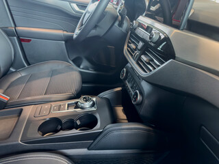 interior close up inside luxury car car driver seats, buttons  dashboard