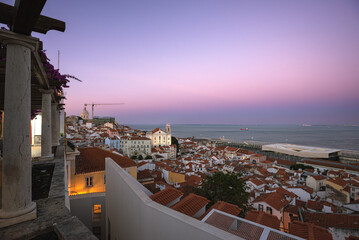 Dusk View of Alfama and the Tagus River from Miradouro de Santa Luzia - Lisbon, Portugal
