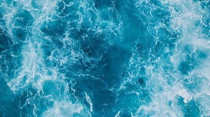 Obraz premium Aerial view of ocean waves, turquoise water texture.