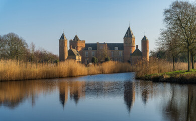 Obraz premium Domburg, Province Zeeland, Netherlands – March 03, 2025 - Westhove Castle, located in the nature reserve de Manteling near Domburg