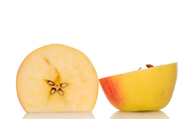 Two halves of a sweet apple, macro, isolated on a white background.
