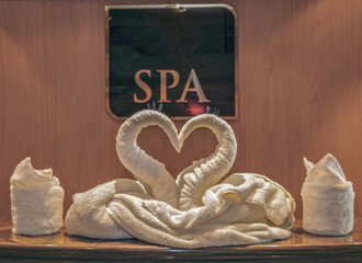 Turkish bath or steam sauna with mosaic tiles inside male locker room of spa or wellness are...