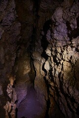 A rock formation in the form of a cave or grotto. Caving and tourism