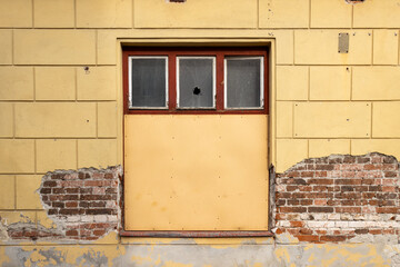 Covered window of an abandoned house, Czechia