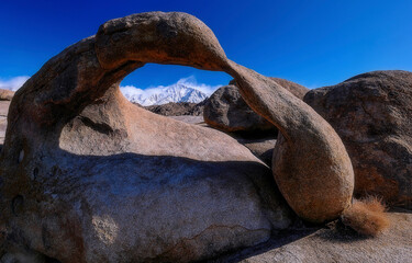 Arch rock in Joshua Tree National Park rocks. Landscape of Hidden valley rocks in Joshua Tree National Park