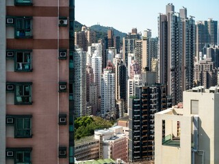 Vibrant urban cityscape featuring densely packed skyscrapers in Hong Kong