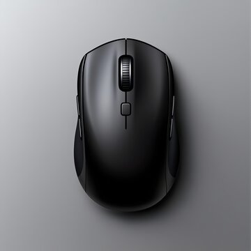 A sleek black computer mouse is displayed on a smooth gray surface. This image captures the essence of modern technology and ergonomic design, ideal for digital workspace themes.