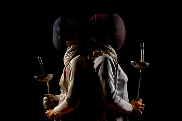 Two fencers, ready for the duel