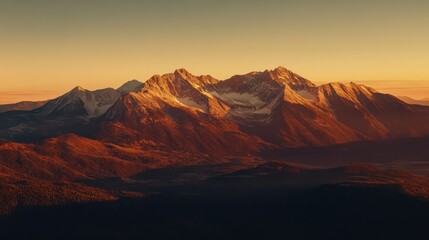 Fototapeta premium Sunset over snow-capped mountains, valley below. Landscape photography for travel brochures